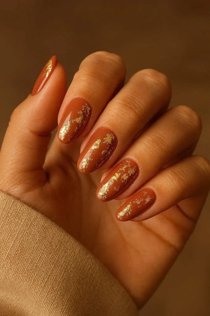 Warm Terracotta With Gold Foil Flakes Warm Terracotta With Gold Foil Flakes — Terracotta Nails 2027