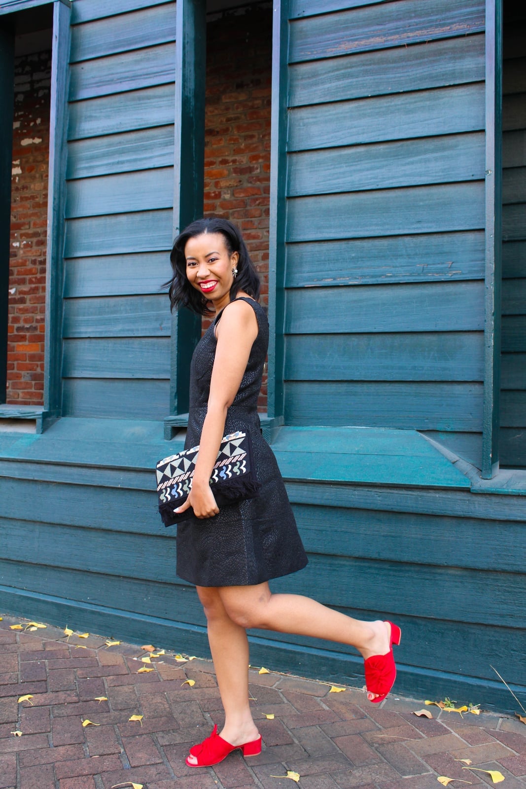 Black A-Line Mini Dress with Red Mules Black A-Line Mini Dress with Red Mules — Thanksgiving Dinner Outfits 2026