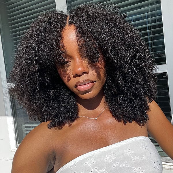 Shoulder Dark Brown Defined Spiral Curls, Close-Up Take Shoulder Dark Brown Defined Spiral Curls, Close-Up Take — Tight Curls 2027
