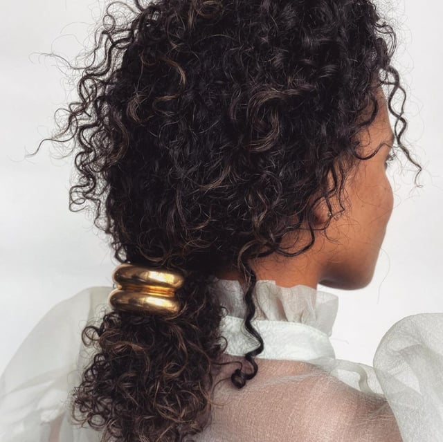Mid-Back Ponytail With Gold Accessory Mid-Back Ponytail With Gold Accessory — Tight Curly Hairstyles 2027