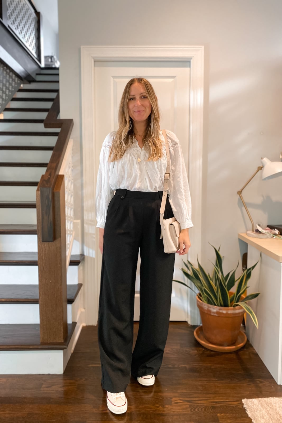 Black Wide Leg Trousers With White Embroidered Blouse, Close-Up Take Black Wide Leg Trousers With White Embroidered Blouse, Close-Up Take — Trousers Outfits 2027 with Blouse