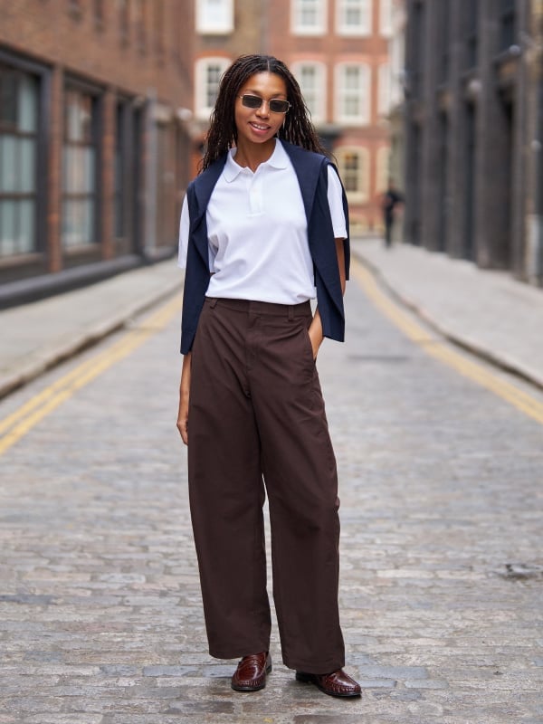 Brown Barrel Leg Trousers With White Polo Shirt And Navy Cardigan Brown Barrel Leg Trousers With White Polo Shirt And Navy Cardigan — Trousers Outfits 2027 with Blouse