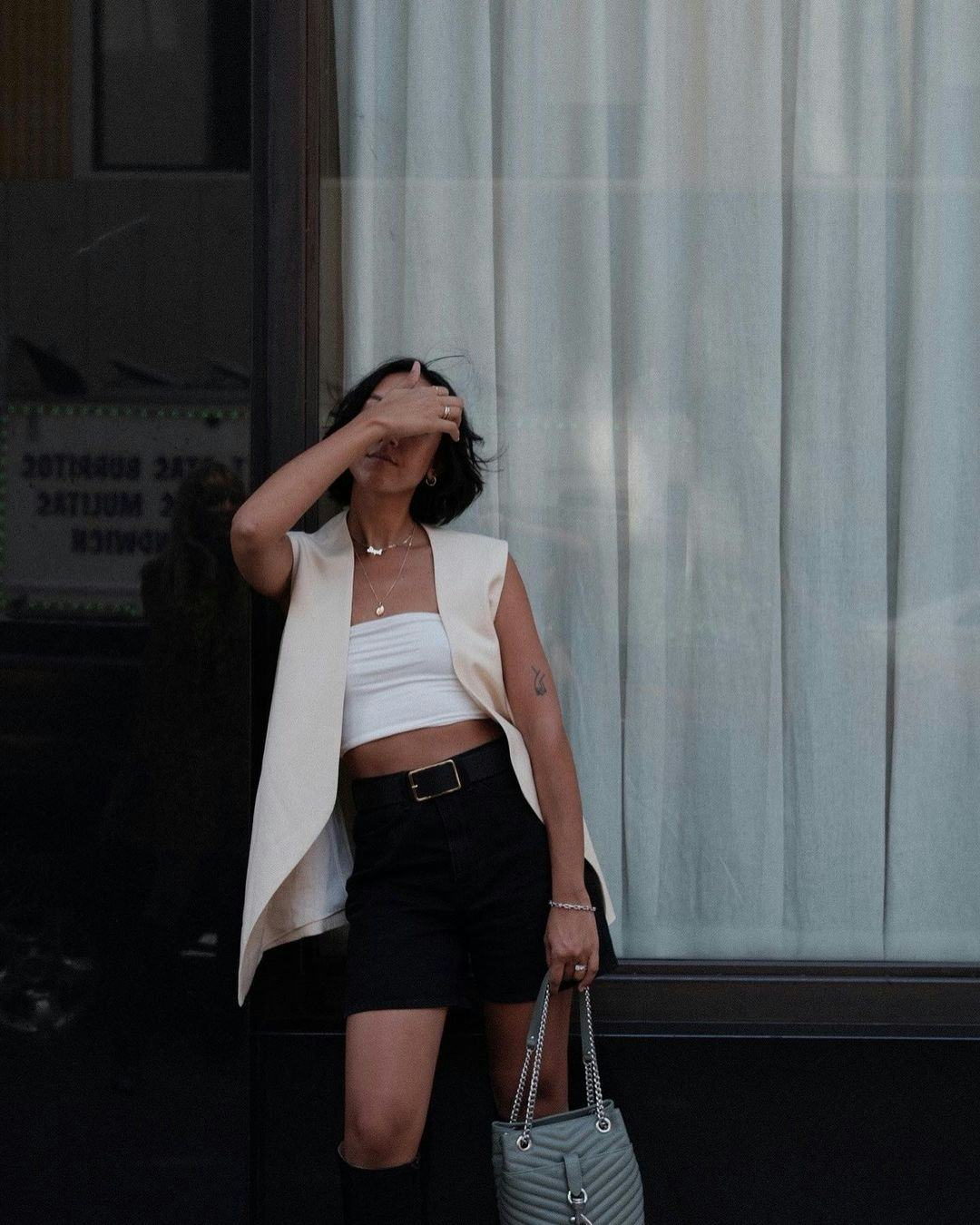 Ribbed Tube Top Layered Under Oversized Vest, Knee-High Boots Ribbed Tube Top Layered Under Oversized Vest, Knee-High Boots — Tube Crop Top Outfits 2027
