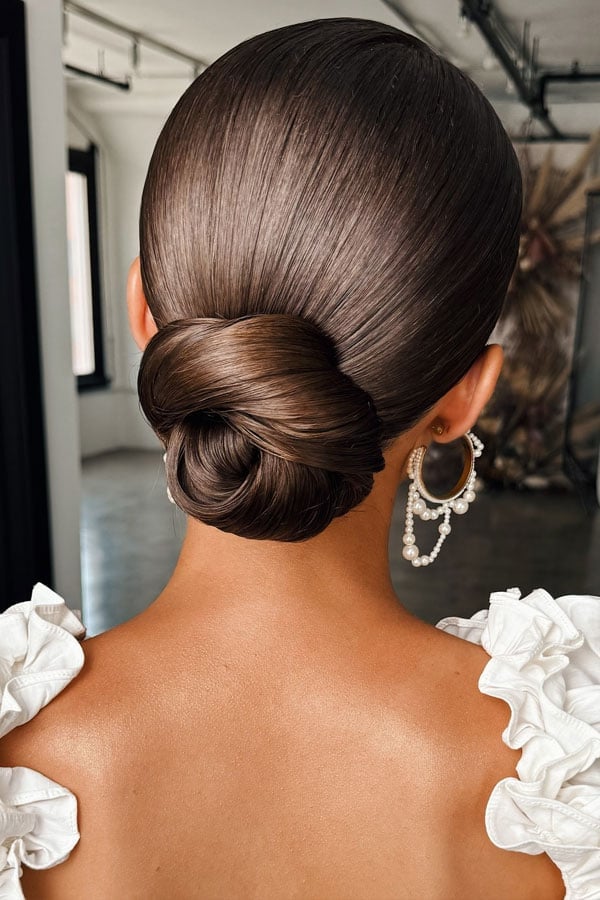 Sleek Dark Brown Low Twisted Bun Sleek Dark Brown Low Twisted Bun — Twisted Bun Hairstyles 2027