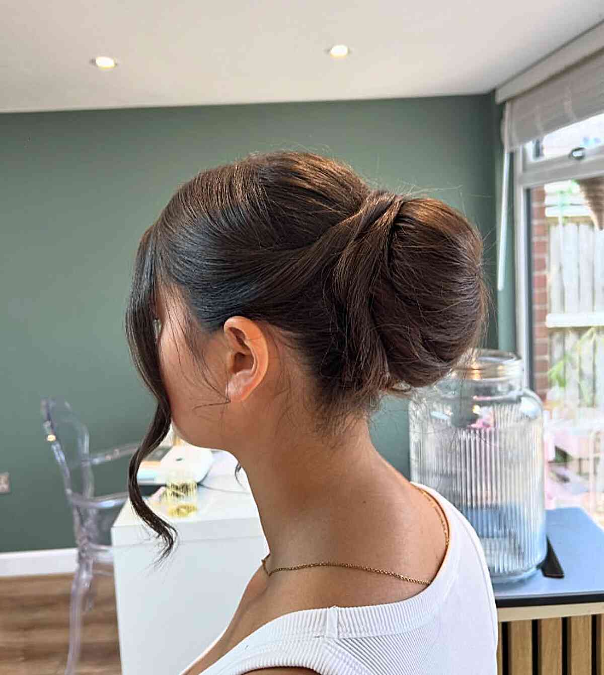 Side Low Twisted Bun With Soft Waves Side Low Twisted Bun With Soft Waves — Twisted Bun Hairstyles 2027