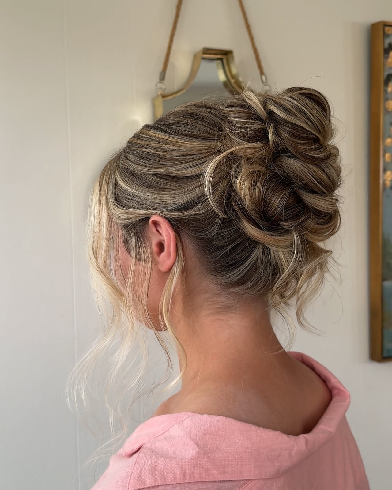 Textured Low Bun With Loose Tendrils Textured Low Bun With Loose Tendrils — Twisted Bun Hairstyles 2027