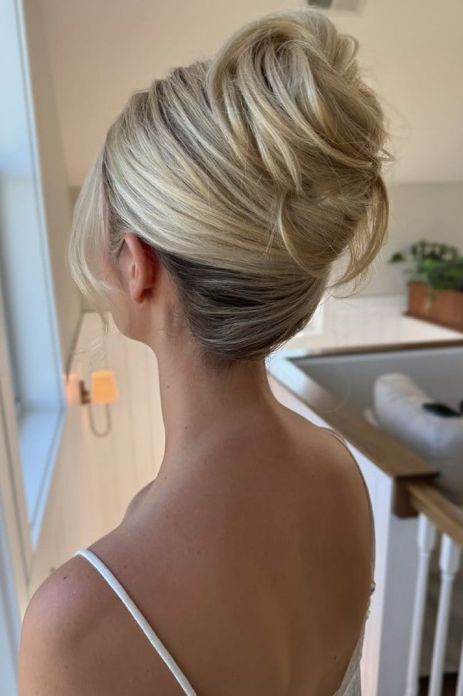 Voluminous Blonde High Twisted Bun Voluminous Blonde High Twisted Bun — Twisted Bun Hairstyles 2027