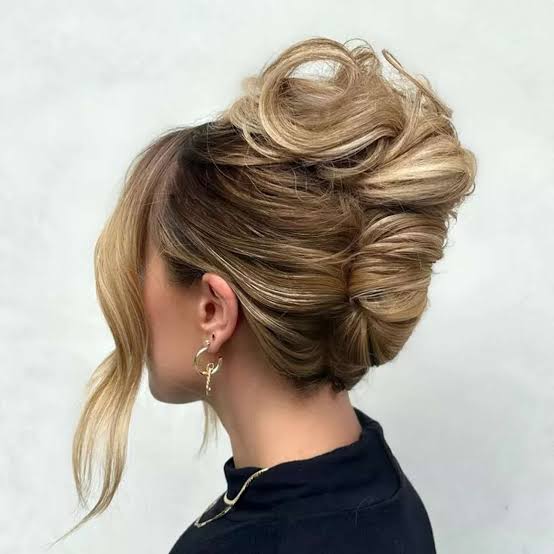 Ash Blonde Twisted Updo With Side-Swept Bangs Ash Blonde Twisted Updo With Side-Swept Bangs — Twisted Bun Hairstyles 2027