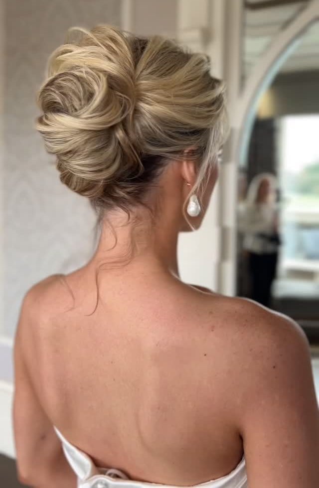 Romantic Bridal Twisted Bun With Face-Framing Pieces Romantic Bridal Twisted Bun With Face-Framing Pieces — Twisted Bun Hairstyles 2027