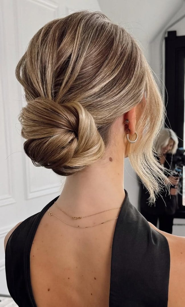 Smooth Dark Blonde Low Twisted Bun With Face-Framing Pieces, Straight Smooth Dark Blonde Low Twisted Bun With Face-Framing Pieces, Straight — Twisted Bun Hairstyles 2027