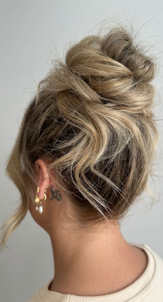 Ash Blonde Mid-Back Messy Bun With Loose Tendrils — Undone Hairstyles 2027