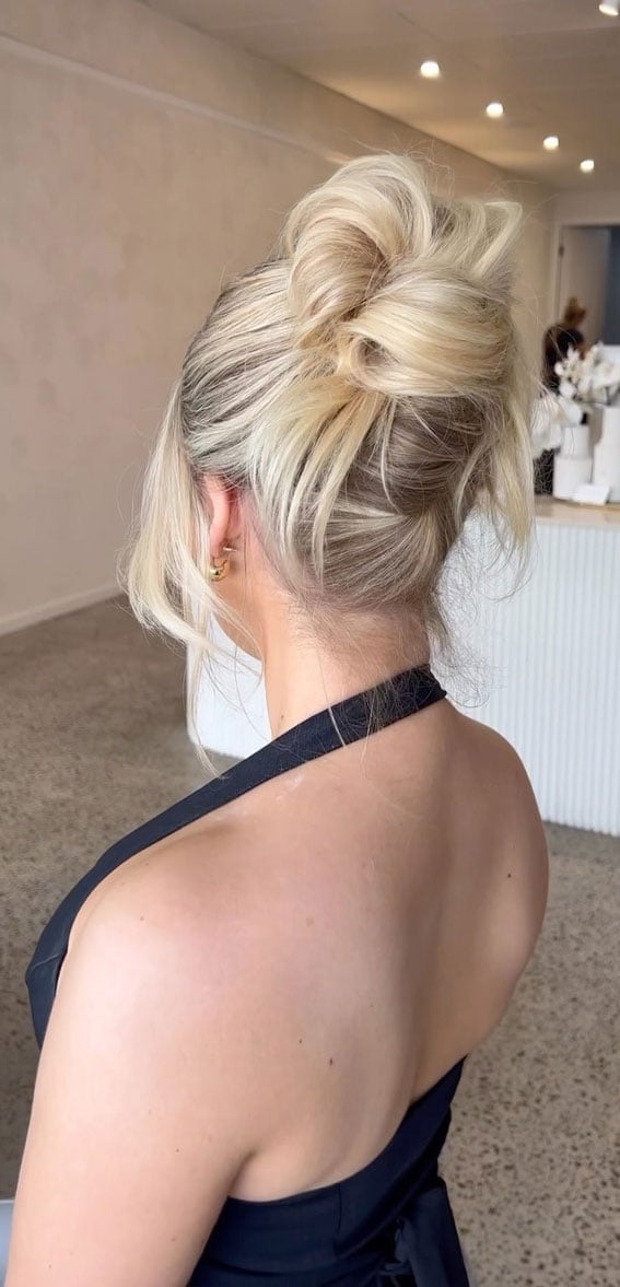 Mid-Back Ash Blonde High Bun With Loose Strands, Wavy — Undone Hairstyles 2027