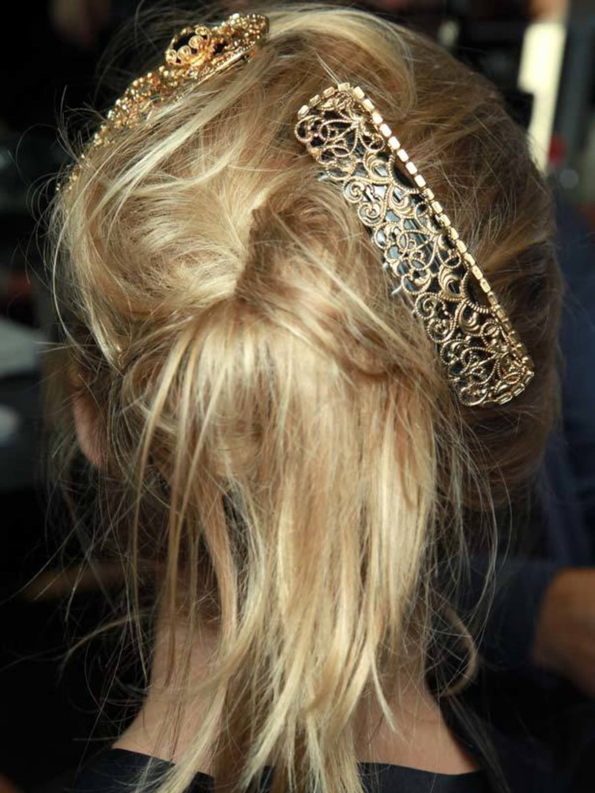 Shoulder Length Blonde Messy Bun With Loose Strands — Undone Hairstyles 2027
