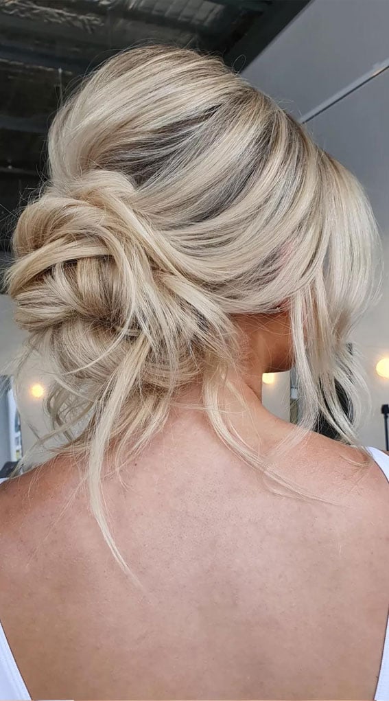 Mid-Back Ash Blonde Low Bun With Face-Framing Pieces — Undone Hairstyles 2027