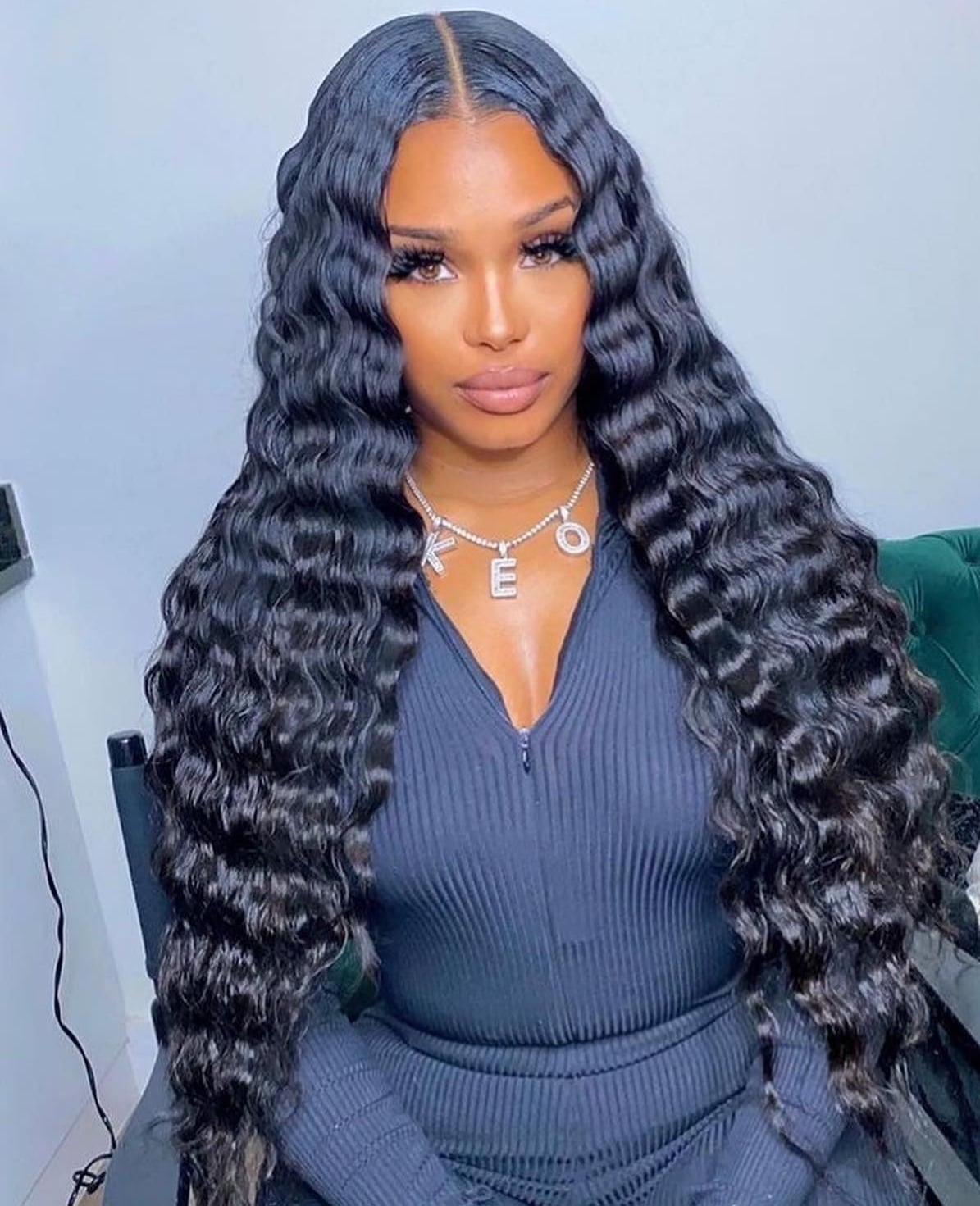 Mid-Back Black Wavy Hair With Middle Part Mid-Back Black Wavy Hair With Middle Part — Vacation Hairstyles 2027 with Weave