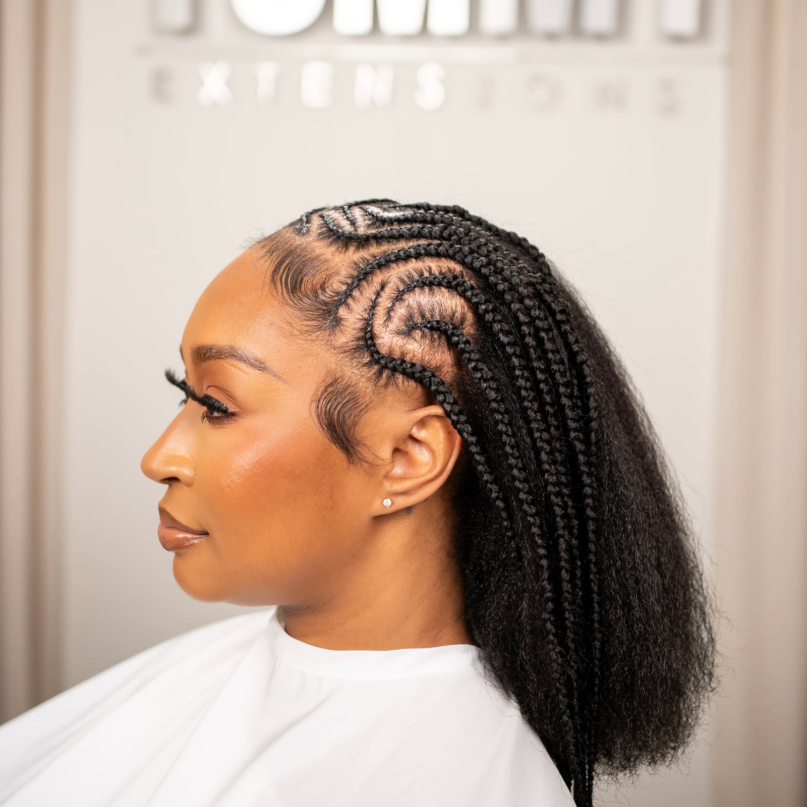 Shoulder Length Cornrows With Swirl Pattern Shoulder Length Cornrows With Swirl Pattern — Vacation Hairstyles 2027 with Weave