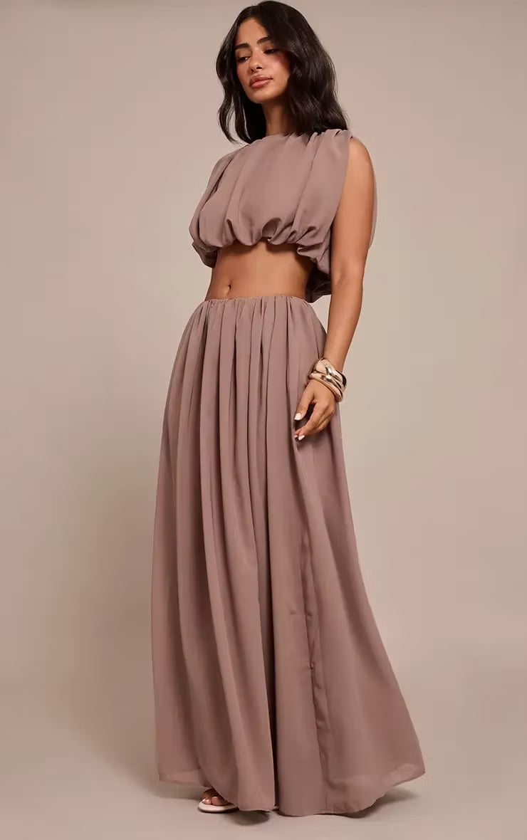 Mauve chiffon cropped top with puffed sleeves and pleated maxi skirt Mauve chiffon cropped top with puffed sleeves and pleated maxi skirt — Vegas Show Outfits 2027