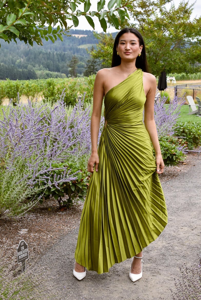 Lime green pleated one-shoulder gown with white heels Lime green pleated one-shoulder gown with white heels — Wedding Guest Outfits Vineyard 2027