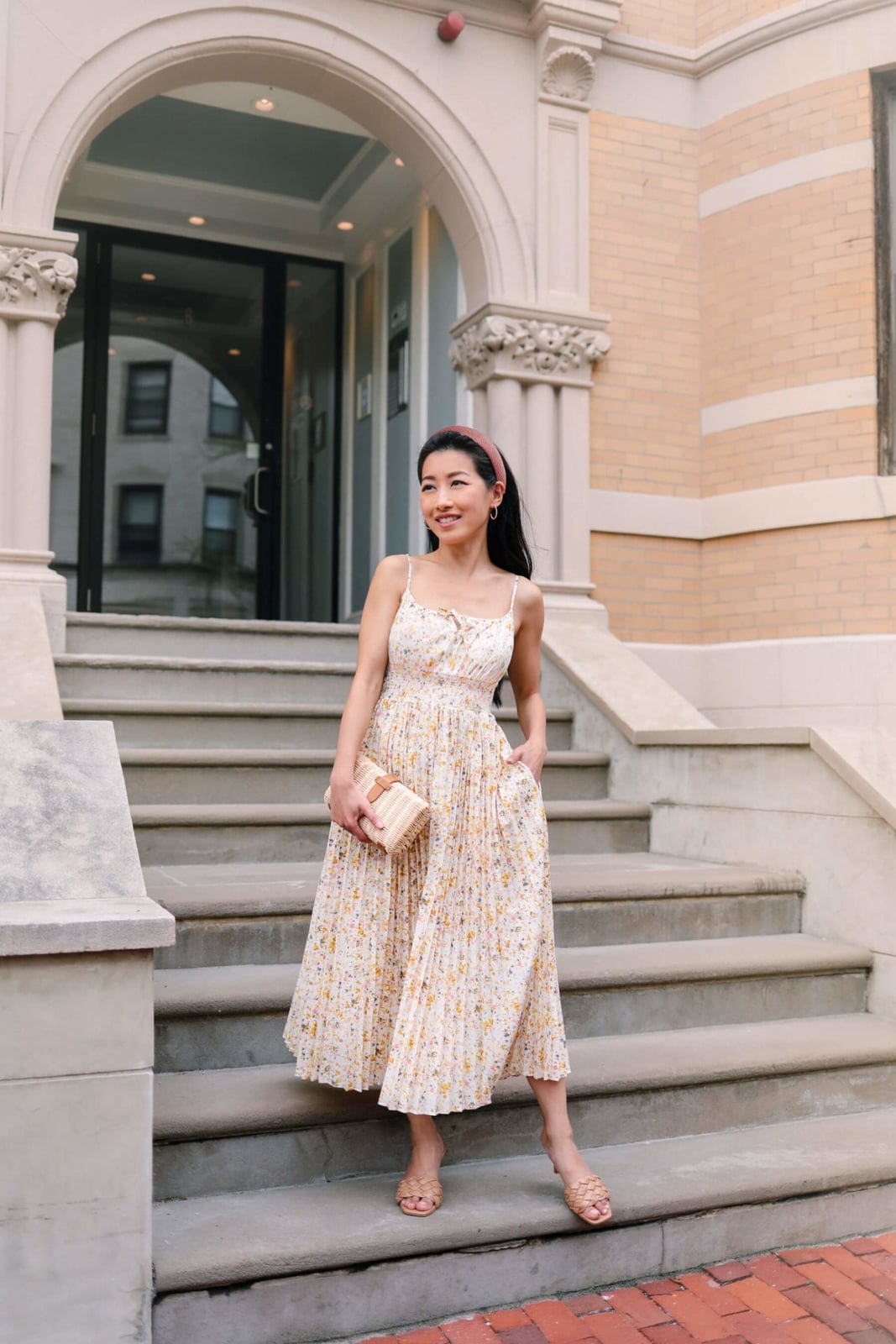 Cream floral midi dress with pleated skirt and sandals Cream floral midi dress with pleated skirt and sandals — Wedding Guest Outfits Vineyard 2027