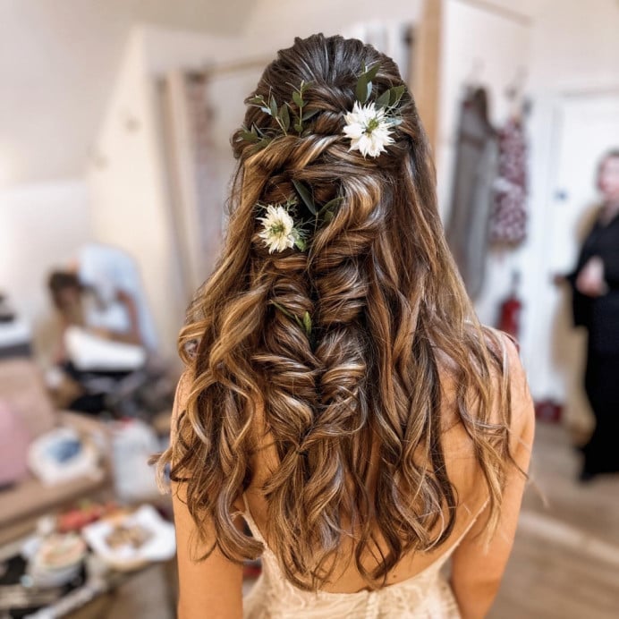 Long Brown Braided Half-Up with Waves and Flowers Long Brown Braided Half-Up with Waves and Flowers — Wedding Hairstyles 2027 with Curls