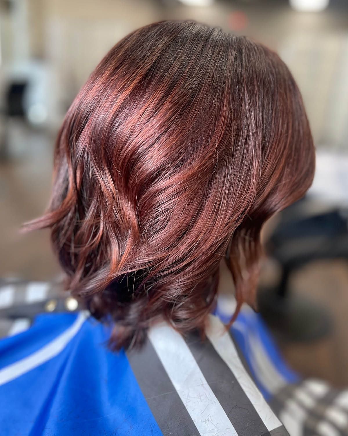 Collarbone Bob With Dark Red Highlights Collarbone Bob With Dark Red Highlights — Winter Hair Gloss 2027