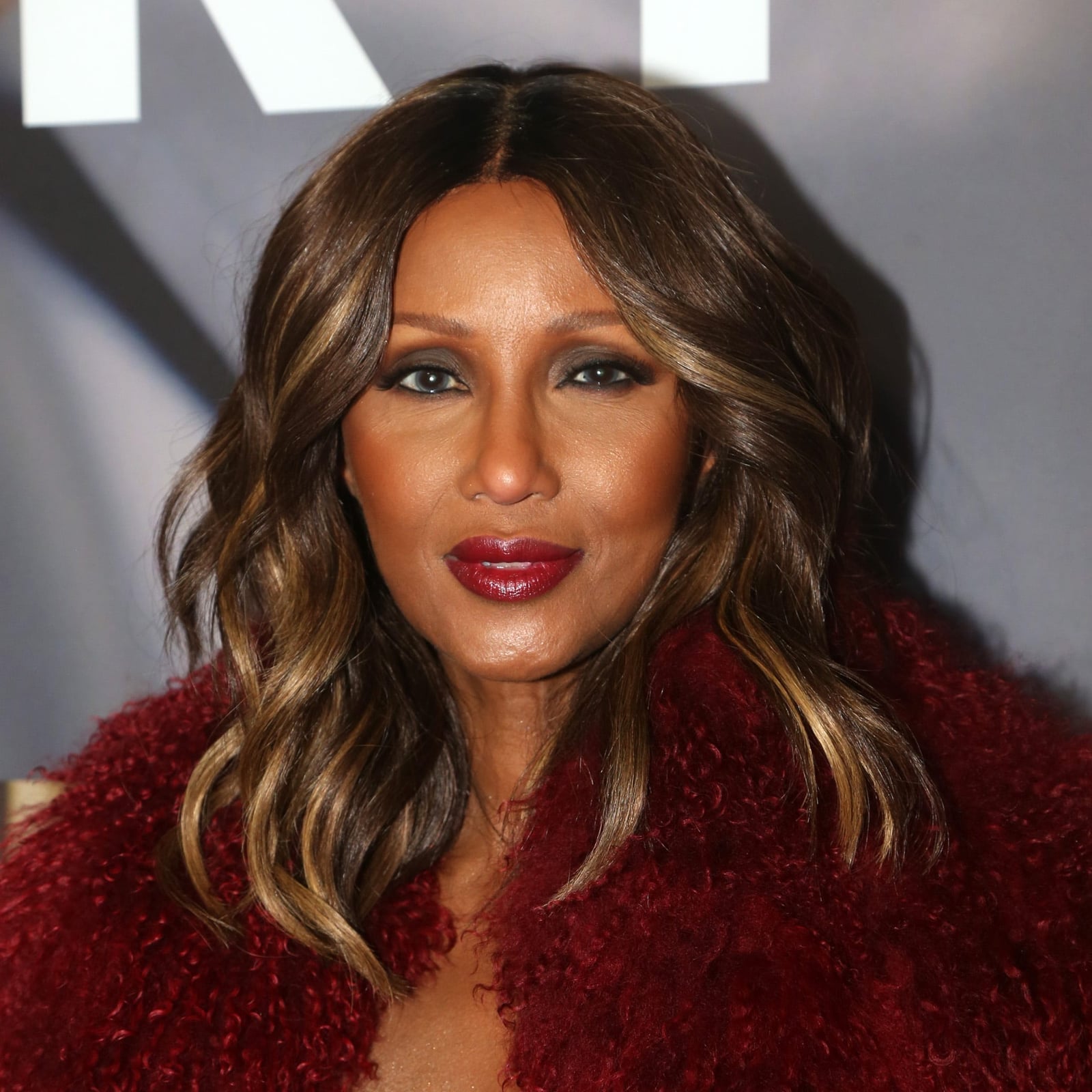 Dark Brown Collarbone Layers With Blonde Balayage — Winter Haircuts 2027 for Oval Faces
