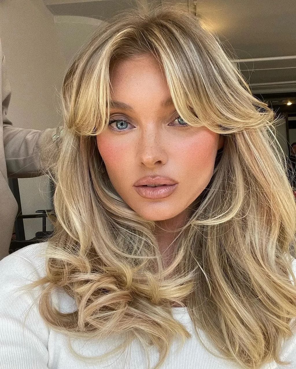 Ash Blonde Collarbone Bob With Curtain Bangs — Winter Haircuts 2027 for Oval Faces