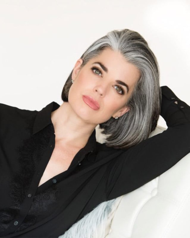 Silver Gray Ear Length Bob With Side Part — Winter Haircuts 2027 for Oval Faces