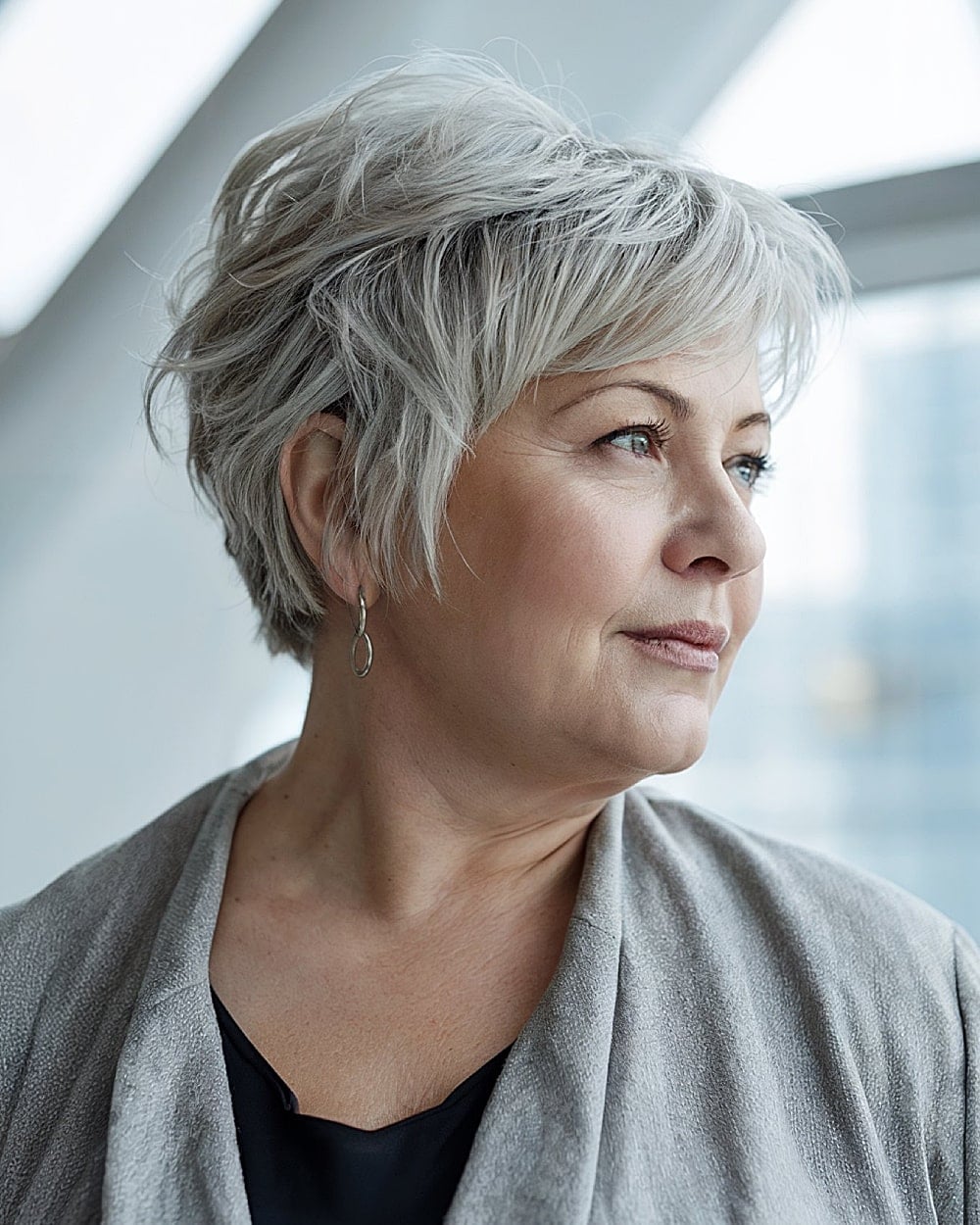 Silver Gray Ear Pixie With Wispy Bangs — Winter Haircuts 2027 for Oval Faces