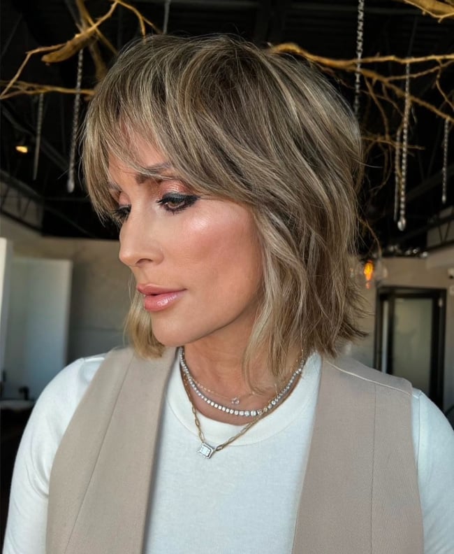 Honey Blonde Shoulder Shag With Choppy Bangs — Winter Haircuts 2027 for Oval Faces