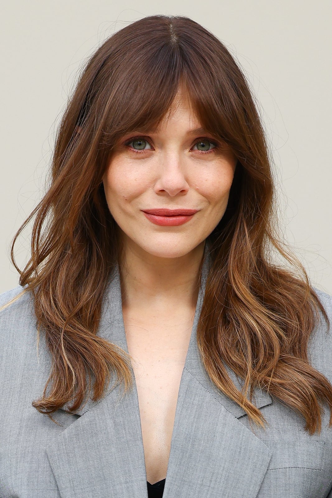 Warm Brown Collarbone Lob With Curtain Bangs — Winter Haircuts 2027 for Oval Faces