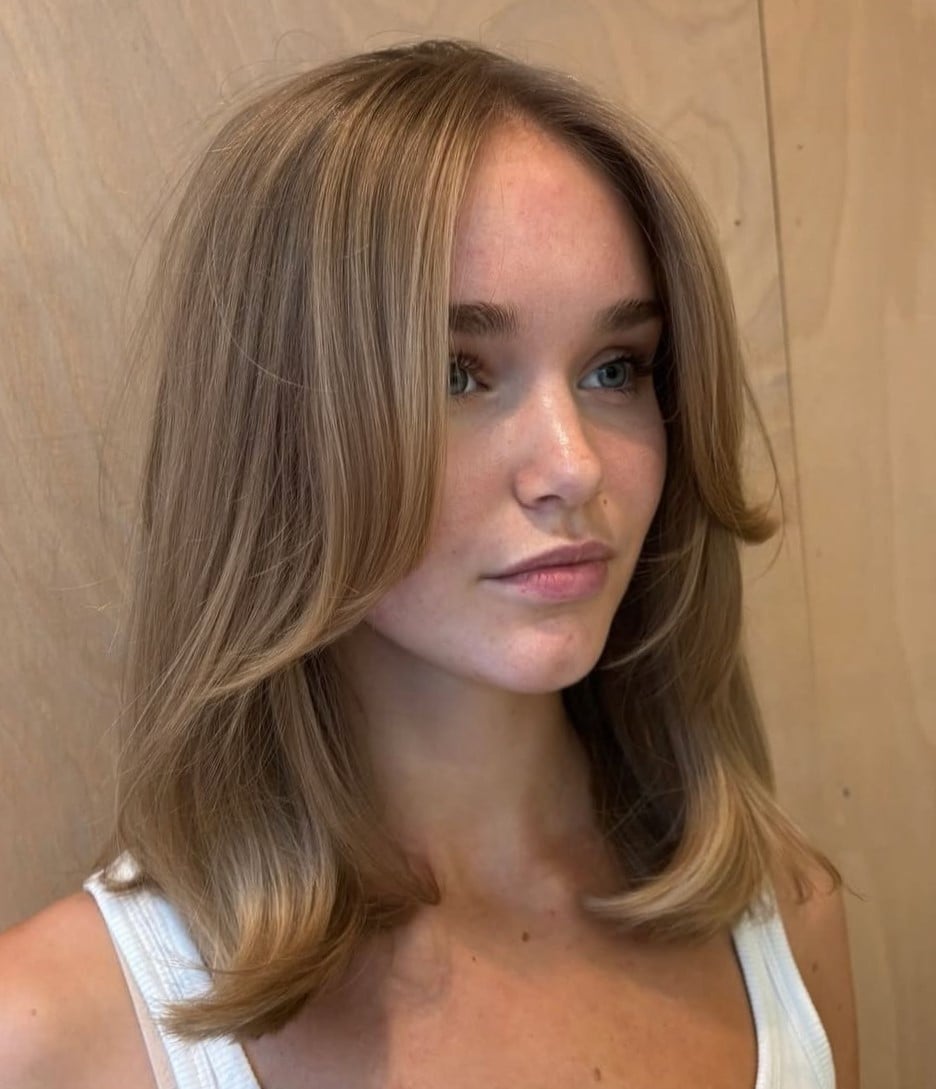 Medium Blonde Collarbone Lob With Curtain Bangs — Winter Haircuts 2027 for Oval Faces