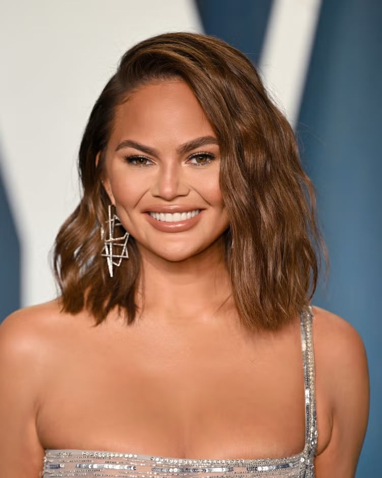 Collarbone Angled Bob With Side Bangs Collarbone Angled Bob With Side Bangs — Winter Hairstyles 2027 for Round Faces
