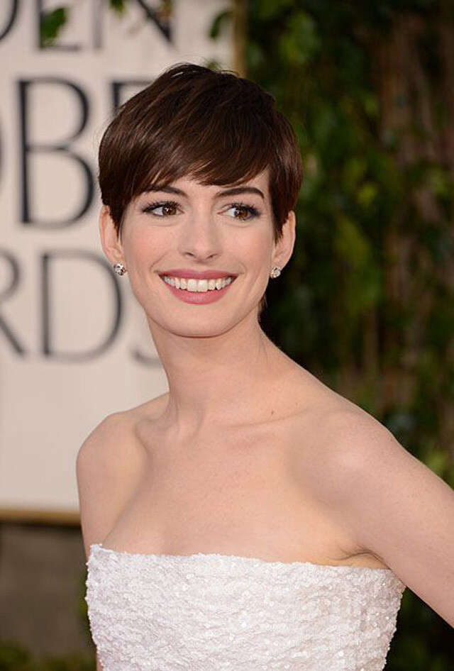 Short Dark Brown Pixie With Side Bangs Short Dark Brown Pixie With Side Bangs — Winter Hairstyles 2027 for Round Faces