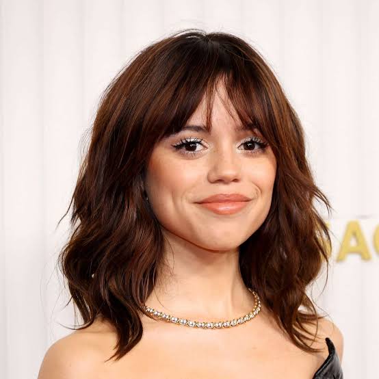 Collarbone Dark Brown Lob With Wispy Bangs Collarbone Dark Brown Lob With Wispy Bangs — Winter Hairstyles 2027 for Round Faces