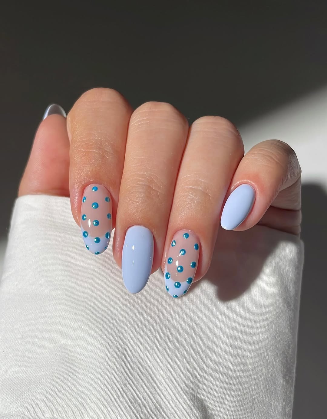 Light Blue Polka Dot Short Oval Nails — Winter Nail Colors 2027 for Pale Skin