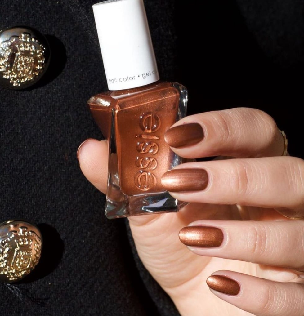 Metallic Bronze Shimmer Medium Oval Nails — Winter Nail Colors 2027 for Pale Skin