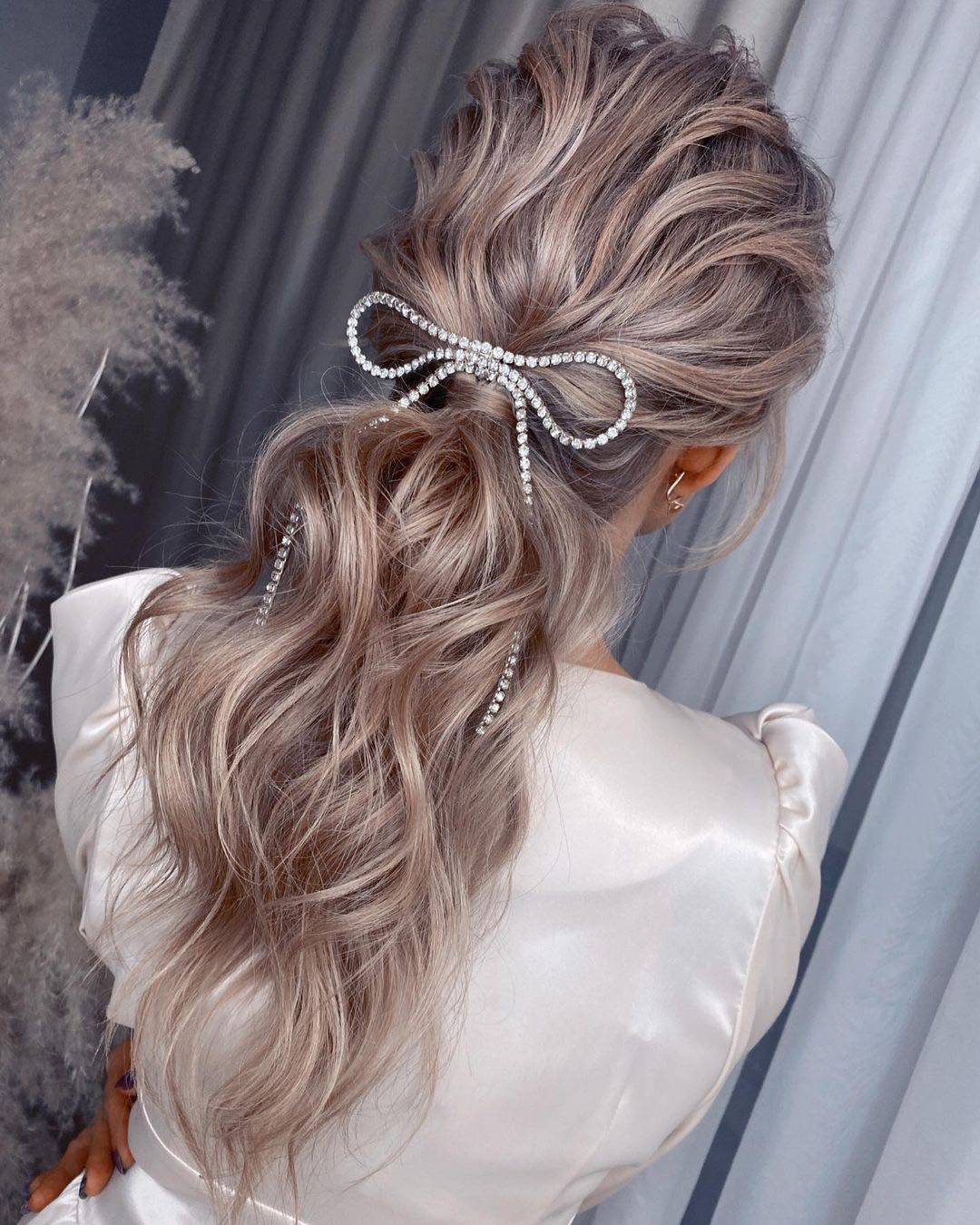 Low Ponytail With Braided Accents and Bow Low Ponytail With Braided Accents and Bow — Winter Ponytail Hairstyles 2027