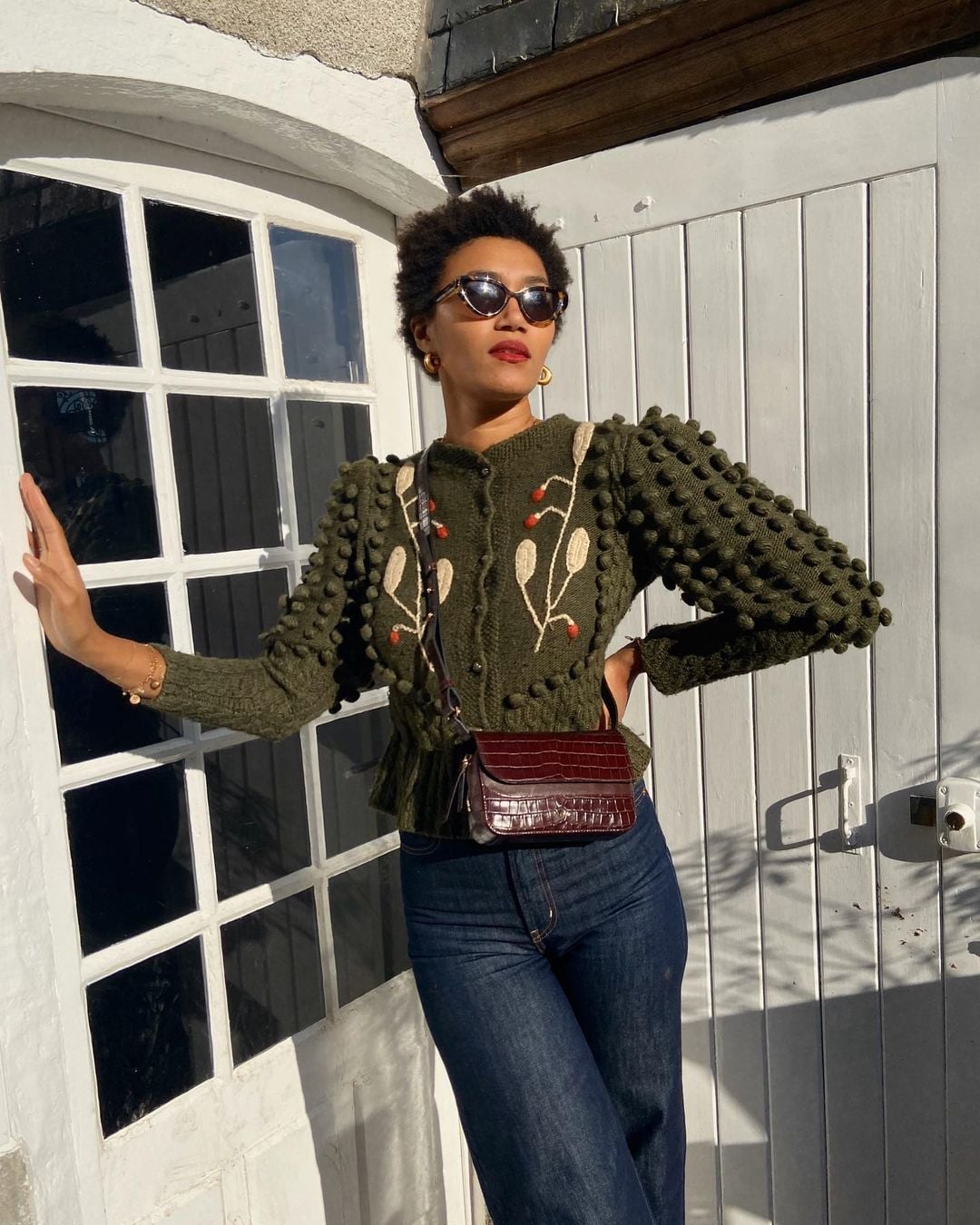 Olive green textured cardigan with dark wash jeans Olive green textured cardigan with dark wash jeans — Winter to Spring Transition Outfits 2027