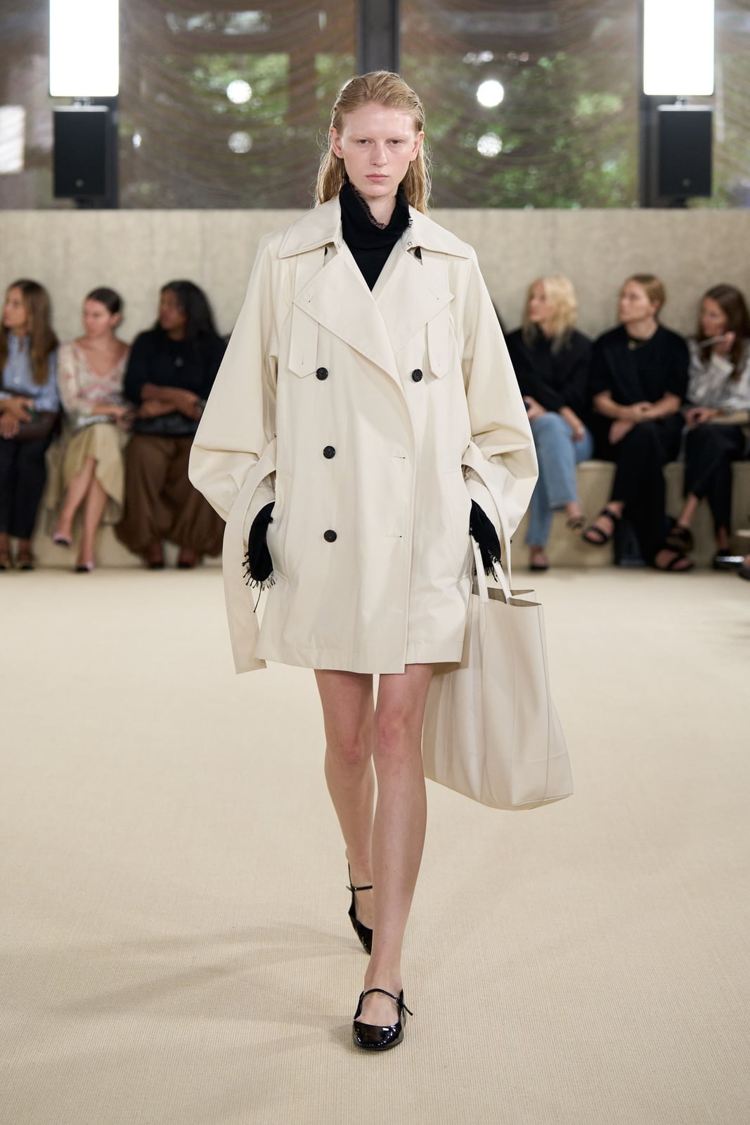 Oversized cream trench coat with turtleneck and mary janes Oversized cream trench coat with turtleneck and mary janes — Winter to Spring Transition Outfits 2027