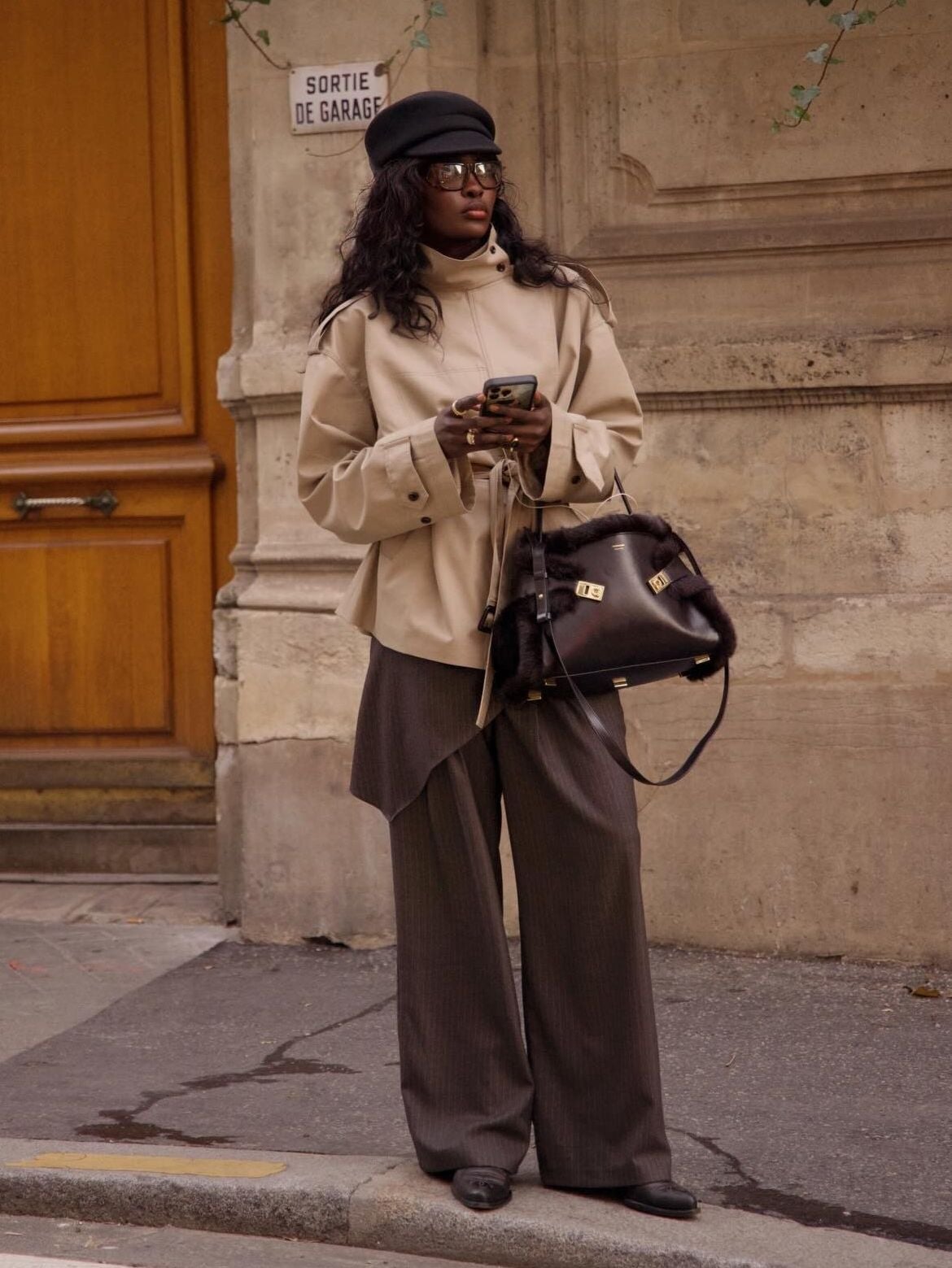 Beige oversized jacket with pinstripe wide leg trousers Beige oversized jacket with pinstripe wide leg trousers — Winter to Spring Transition Outfits 2027